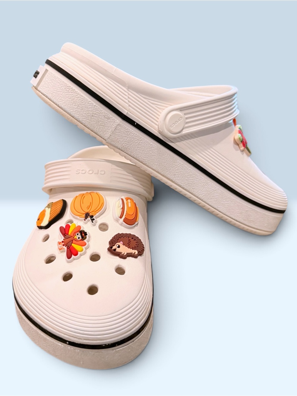 Crocs kiss off court clogs with bonus jibbitz charms